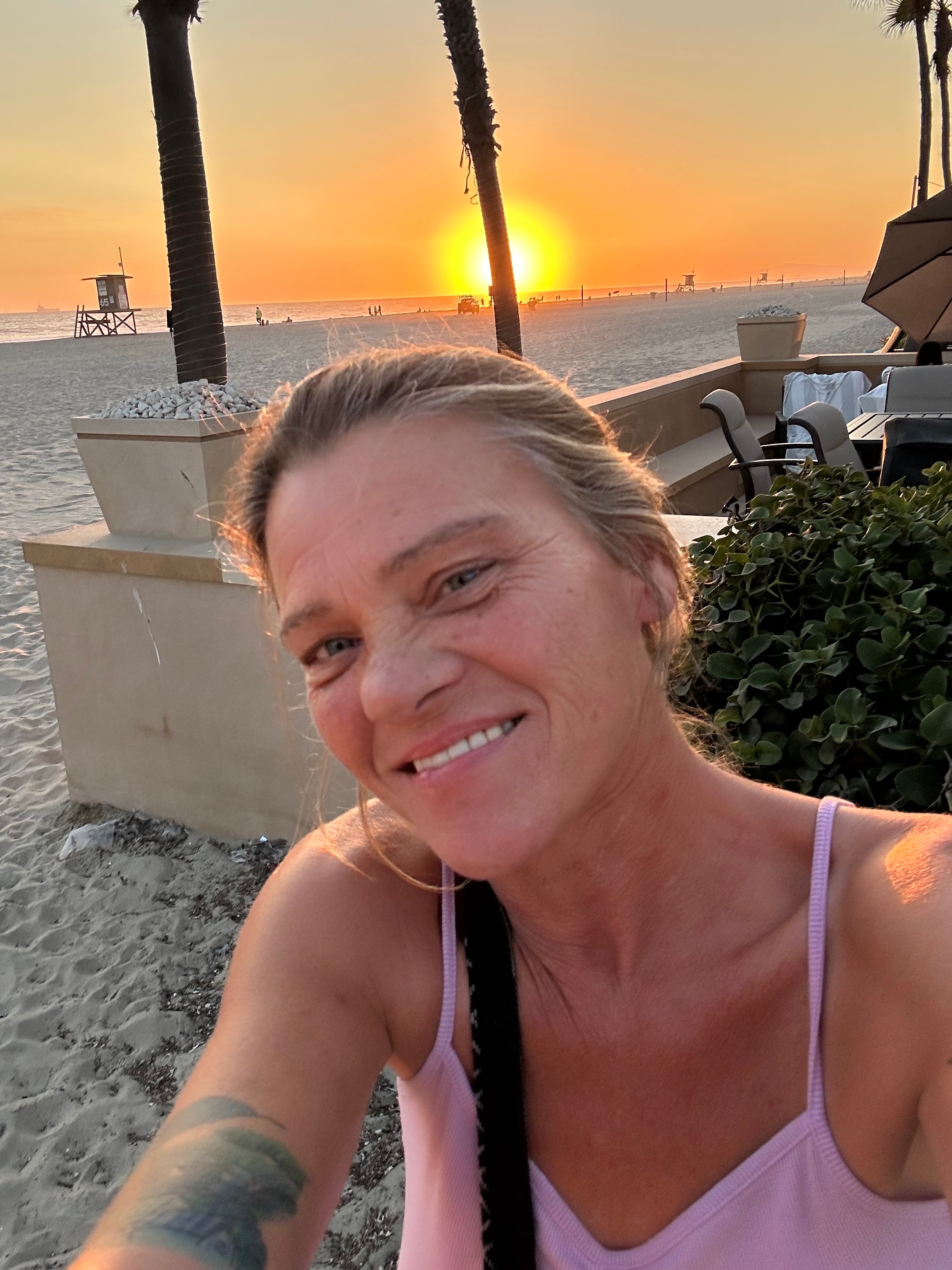 Gigi Hard at sunset on the beach